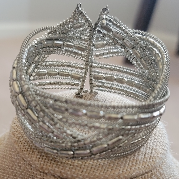 3 fashion bracelets. Two silver, one purple - Picture 2 of 8